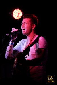 Photo Credit: Bryce Fraser John Vesely of Secondhand Serenade preforming his solo act on his acoustic Guitar for his audience at The Boardwalk Orangevale, CA
